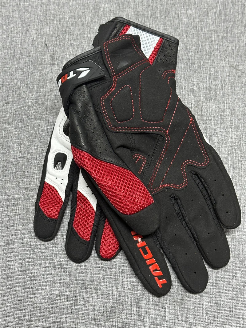 Black and red genuine leather motorcycle motocross gloves shown against a gray background.