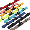 A collection of colorful adjustable tactical backpack strap harnesses in various colors and materials.