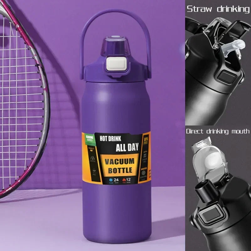 A purple insulated stainless steel water bottle with a black straw drinking mechanism is shown next to a tennis racket.