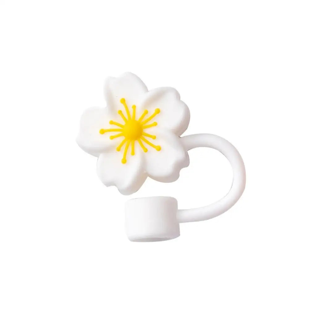 A white silicone butterfly straw cover with yellow accents.