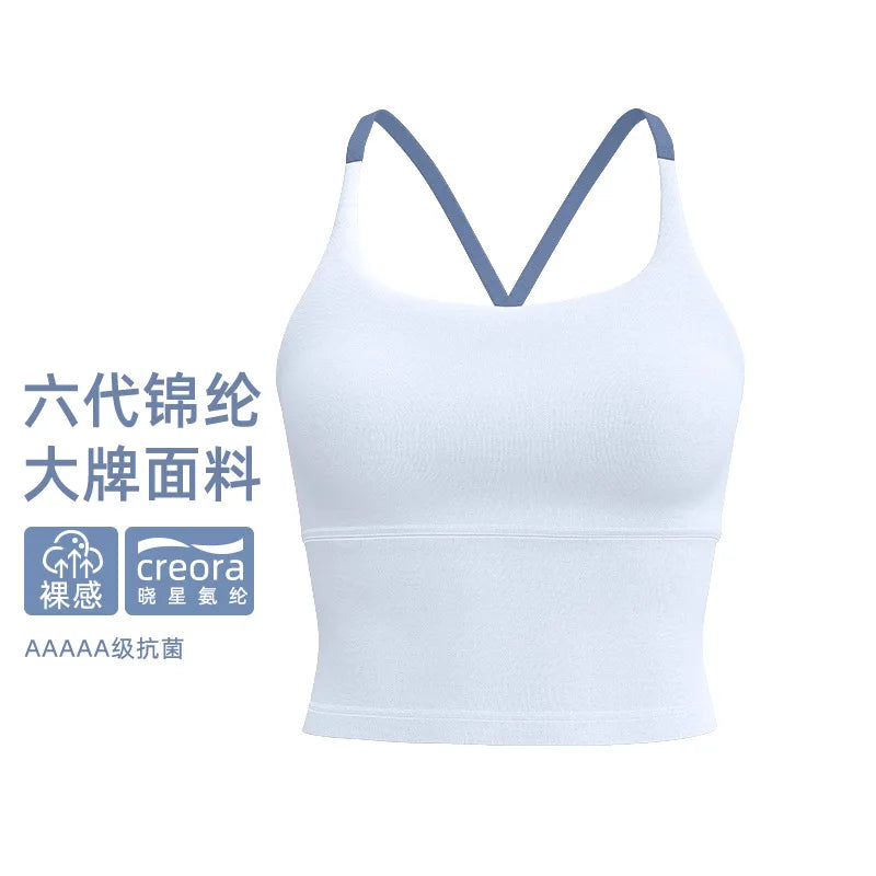 White supportive sports bra for women featuring a V-neck design and breathable fabric.