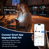 A woman is using a smartphone app to control an electric scooter, demonstrating smart features like battery and mileage track