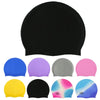 A collection of silicone swim caps in various colors including blue, purple, gray, pink, and yellow.