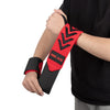 A person is wearing a red and black wrist support wrap on their forearm.