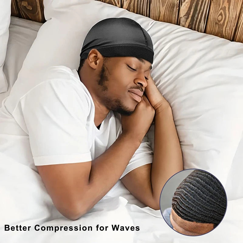 A man is sleeping with a black compression headband on his head, demonstrating better compression for waves.