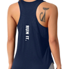 A dark navy running vest with a stylized cat design on the back, worn by a person.
