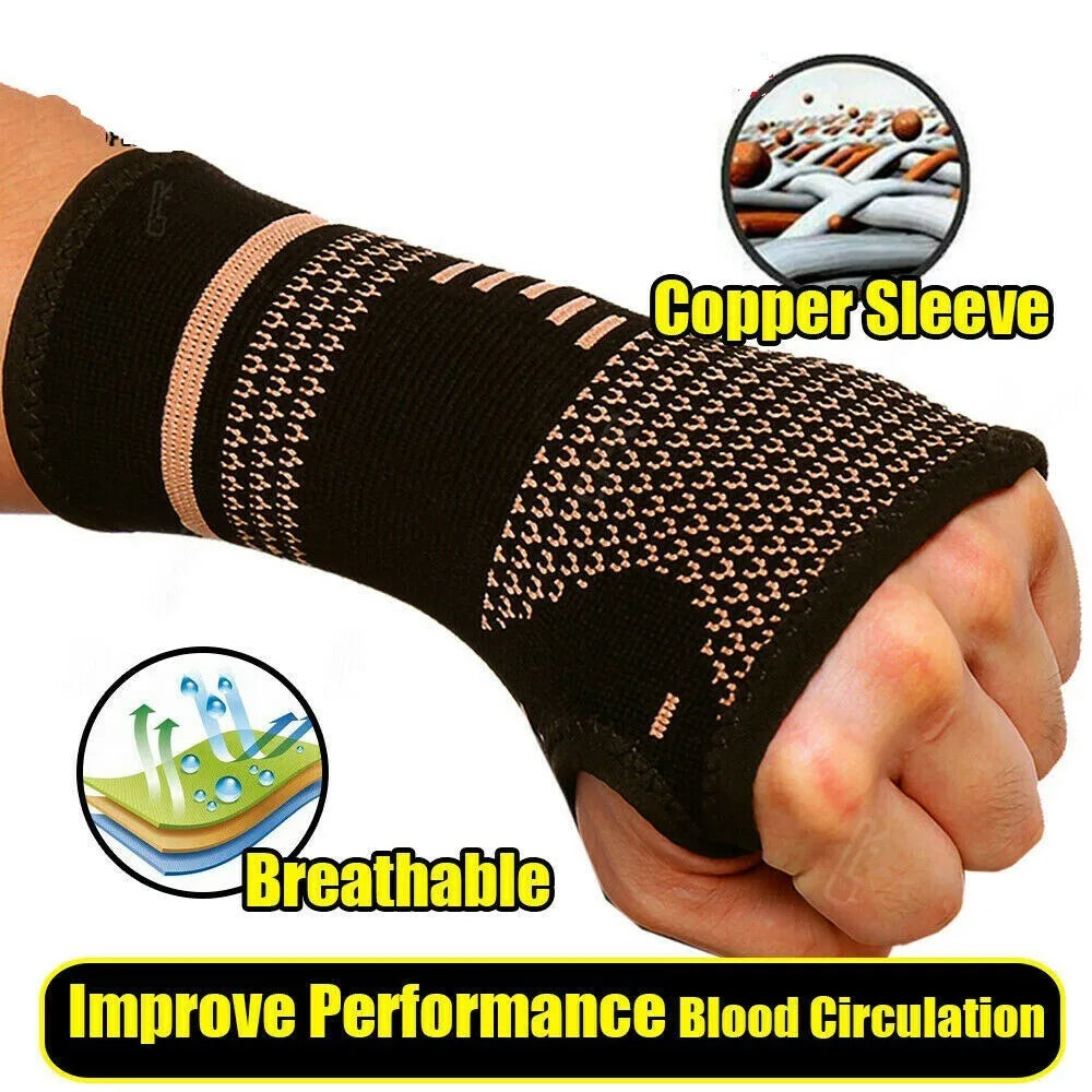 A hand wearing a black copper sleeve wrist compression brace, highlighting its breathable design for improved blood circulati