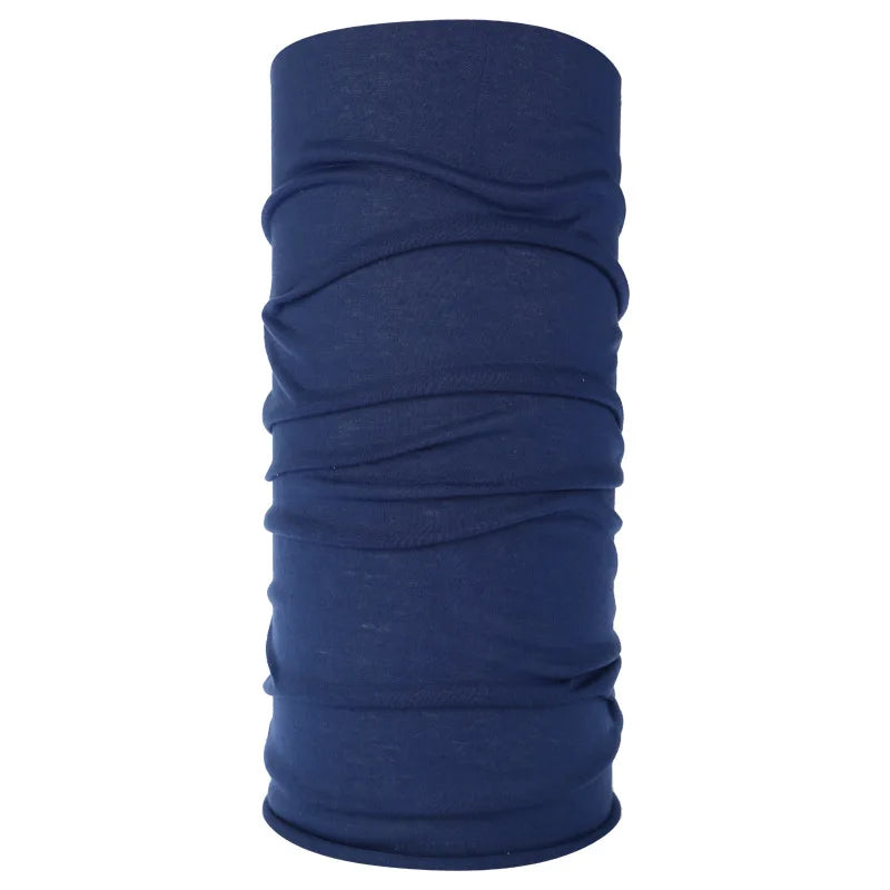 A navy blue seamless fabric headband or balaclava rolled into a cylinder shape.