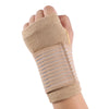 A hand wearing a beige elastic wrist support brace with striped detailing.
