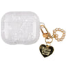 Clear protective case for AirPods Pro with a gold charm featuring a heart and pearl beads