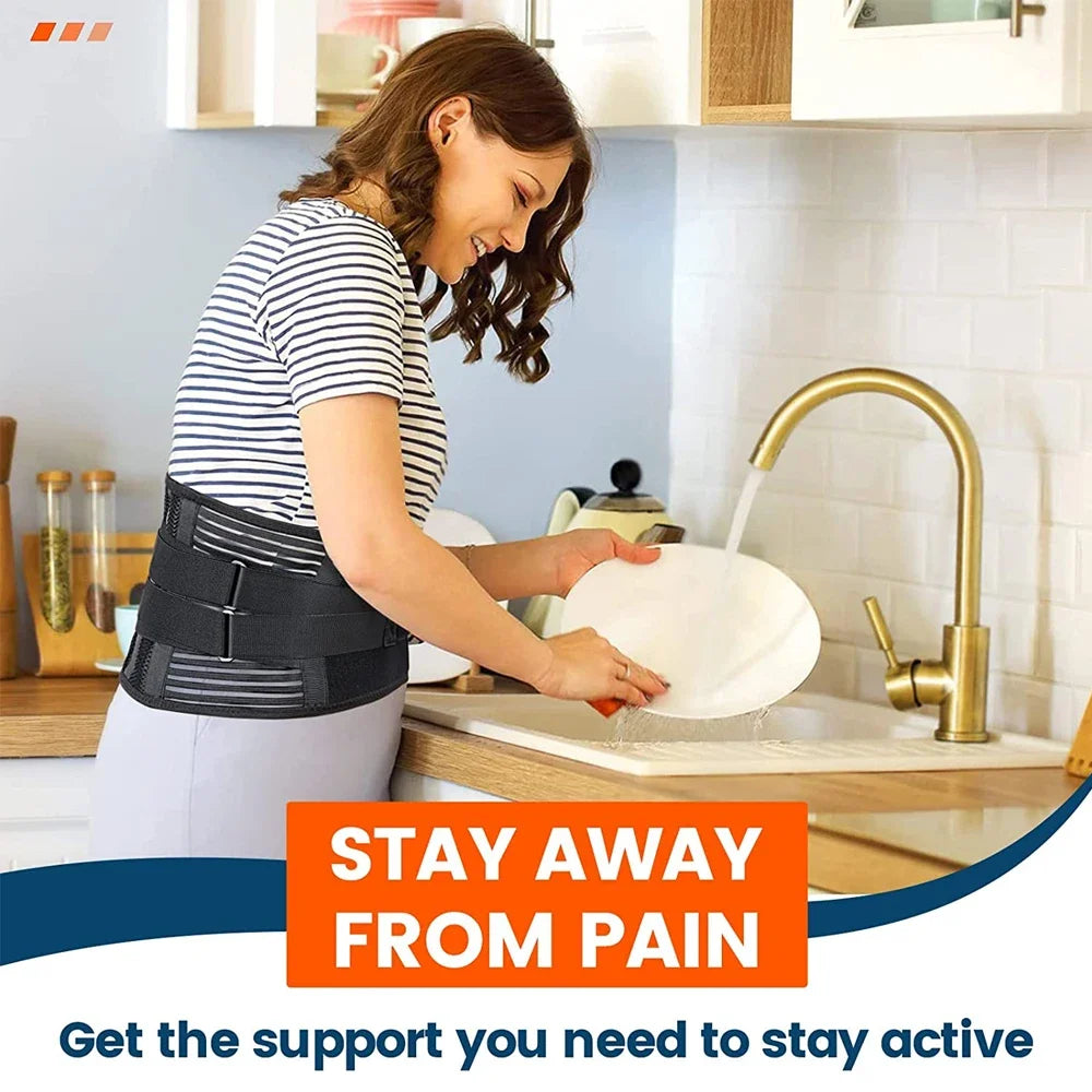 A woman wearing an orthopedic lumbar support belt is washing dishes at a kitchen sink.