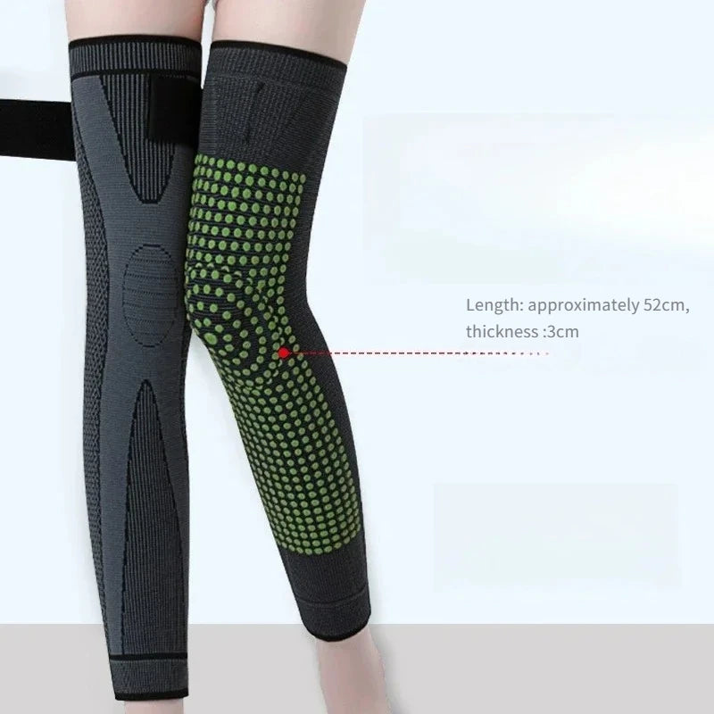 Black elastic knee sleeves with green dotted pattern for warmth and support