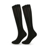 A pair of black high elasticity compression socks standing upright.