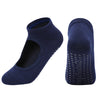 A pair of navy blue breathable women's pilates and yoga socks shown from the side.