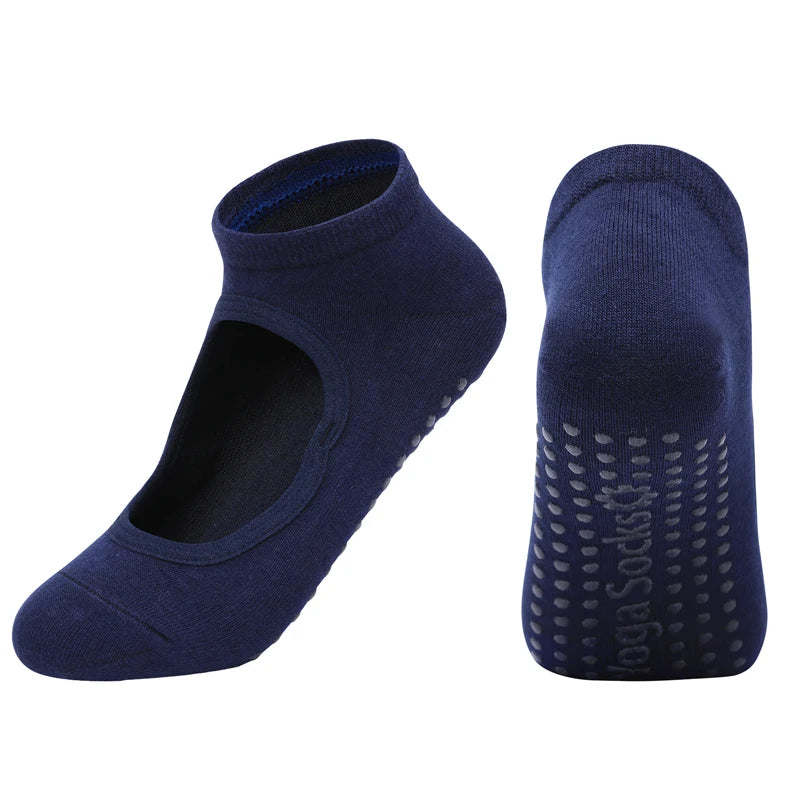 A pair of navy blue breathable women's pilates and yoga socks shown from the side.
