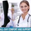 A woman wearing black nurse compression socks smiling in a medical context.