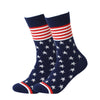 Navy blue socks featuring a red and white striped flag pattern and a star design