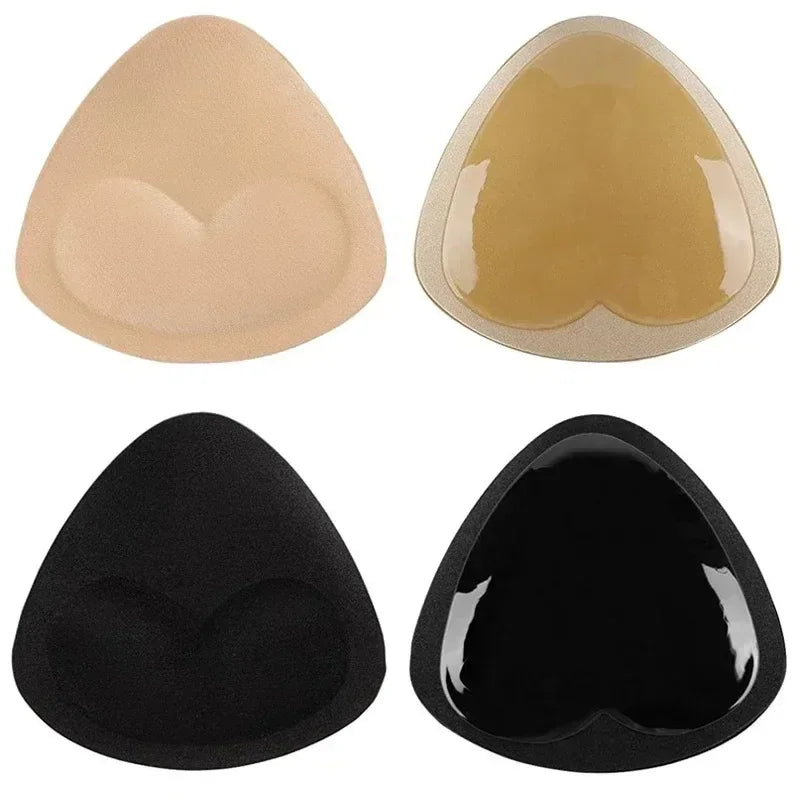 Drei Silikon-BH-Pads in Nude, Beige und Schwarz von oben gezeigt.