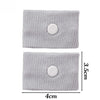 A pair of light gray knitted wristbands designed for anti-nausea and motion sickness relief.