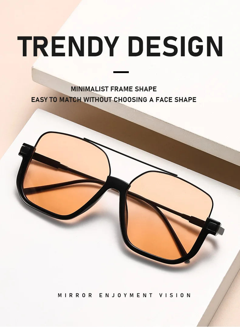 A pair of trendy orange-tinted sunglasses with black frames displayed on a white background.