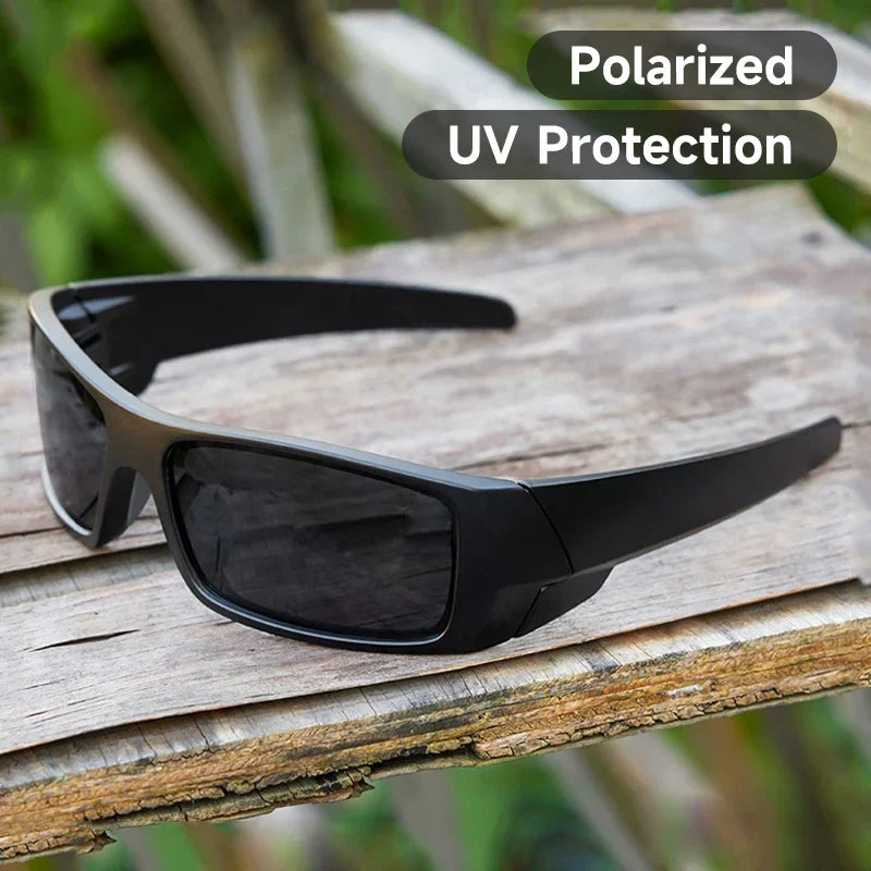 Black polarized UV protection sunglasses resting on a weathered wooden surface.