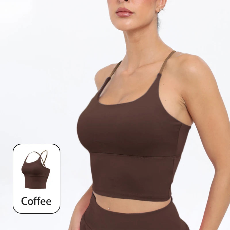 A model wearing a brown summer strappy yoga sports bra with built-in padding.