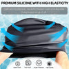 Black silicone swimming cap being put on a person's hair, demonstrating its elasticity and fit.