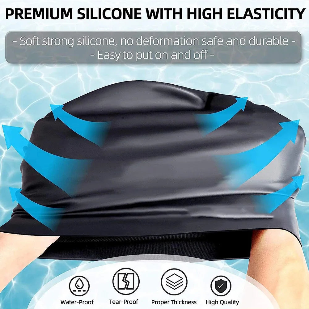 Black silicone swimming cap being put on a person's hair, demonstrating its elasticity and fit.