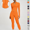 Orangefarbenes Damen-Yoga-Sportset mit langärmeligem Oberteil und Leggings.