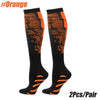 Pair of orange and black sports compression socks