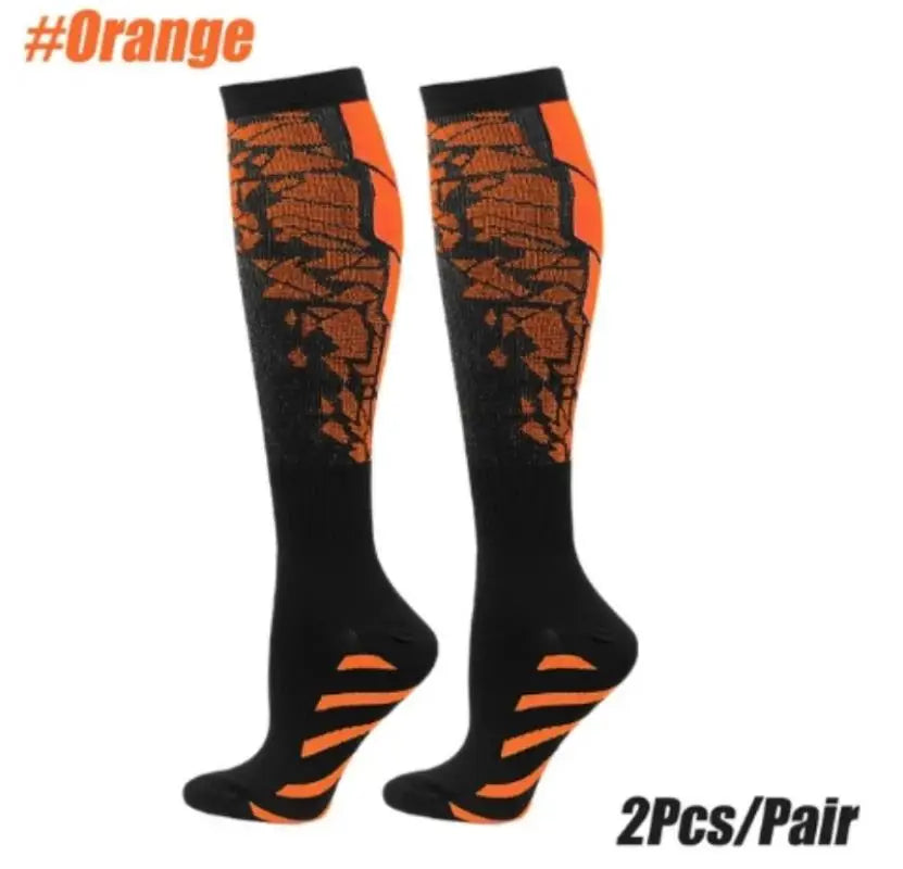 Pair of orange and black sports compression socks