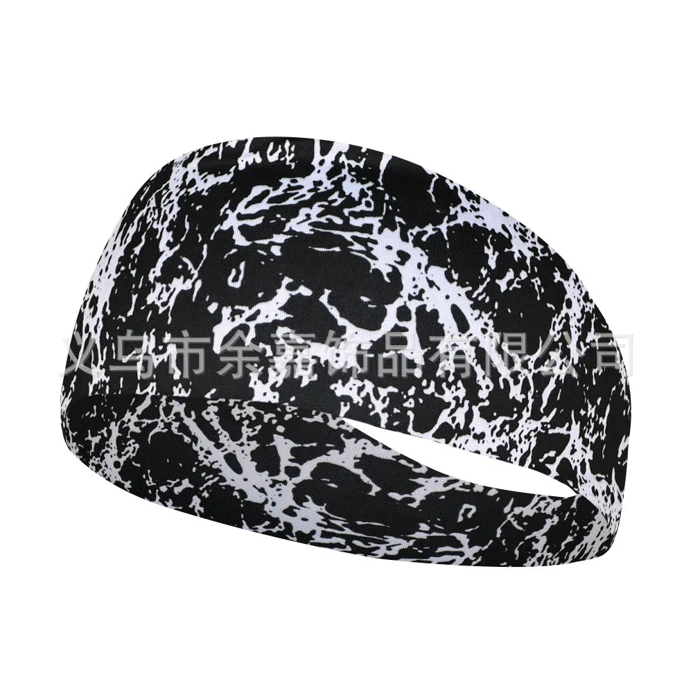 Black and white marbled elastic sports headband worn on a head