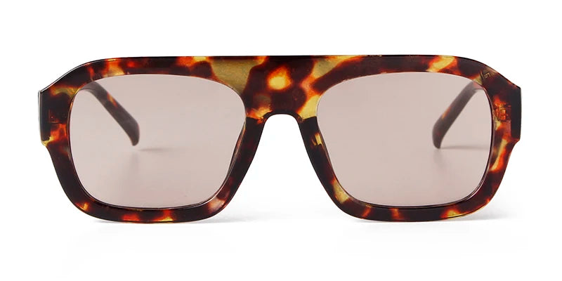 Vintage oversized square sunglasses with a tortoiseshell pattern frame and tinted lenses.