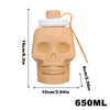 A beige skull design leakproof foldable sports water bottle with a screw cap and straw.