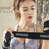 A woman wearing black professional lifting gloves with wrist support on her hand.