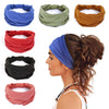 A collection of various colored non-slip elastic headbands for fitness and hair, including blue, green, orange, red, black, a