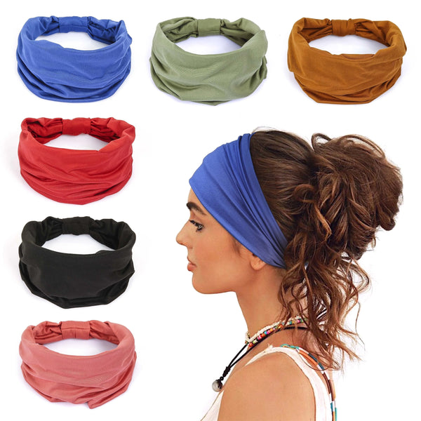 Eine Sammlung verschiedenfarbiger rutschfester elastischer Stirnbänder für Fitness und Haare, darunter blau, grün, orange, ro