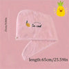 Rosa Stick-Haube zum Trocknen mit Zitronendesign und dem Text "So cool" auf hellem Rosa Hintergrund.