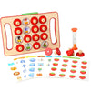 A wooden memory match puzzle board with circular pieces featuring various animals and objects for Montessori learning.