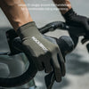 A hand wearing a black cycling glove with the Rockbros logo fits snugly around a bicycle handlebar.