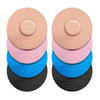 A set of reusable adhesive patches in various pastel and dark colors, arranged in a stack.