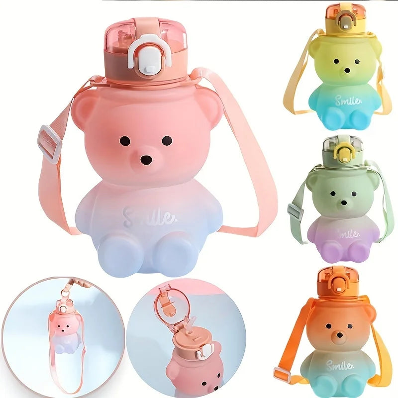 A pink bear-shaped portable water bottle with a straw and strap, shown alongside various colors.