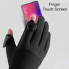 A hand wearing a black glove is touching a finger touchscreen display on a smartphone.