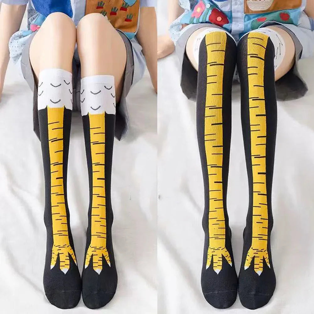Paire de chaussettes fantaisie en forme de pattes de poulet en coton noires et jaunes, montantes