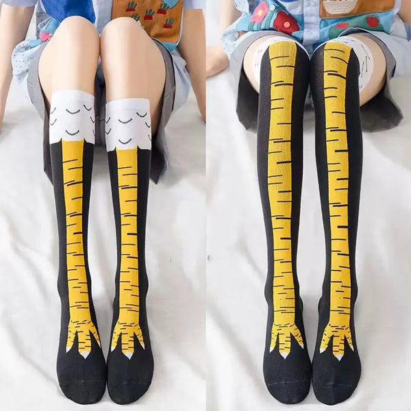 Pair of funny cartoon chicken leg socks over-the-knee in black and yellow