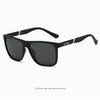 Black polarized sports sunglasses with black frames shown against a white background.