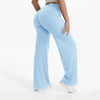 Light blue NCLAGEN SoftMotion straight leg yoga pants worn by a person.