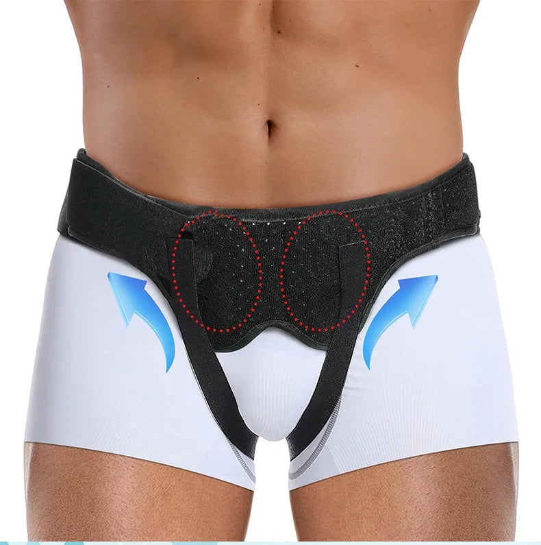 Black hernia support belt worn around the abdomen with blue arrows indicating direction.