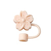 A light pink silicone butterfly straw cover for tumblers.