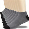 A set of ten gray and black ankle socks displayed vertically.